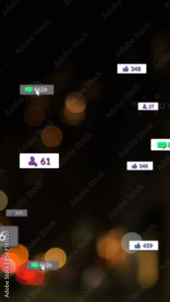 Animation of social media icons and numbers over out of focus city lights