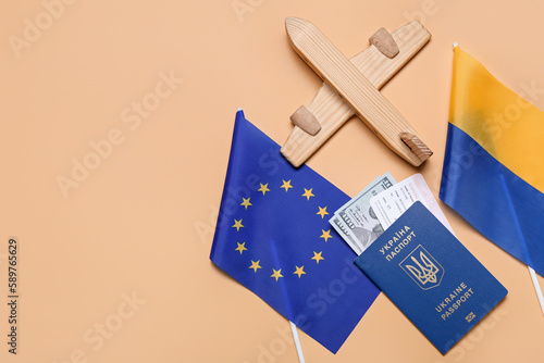Passport with wooden airpla...