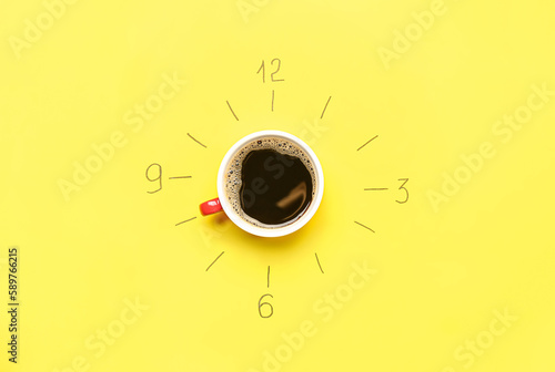 Creative composition with drawn clock and cup of coffee on yellow background