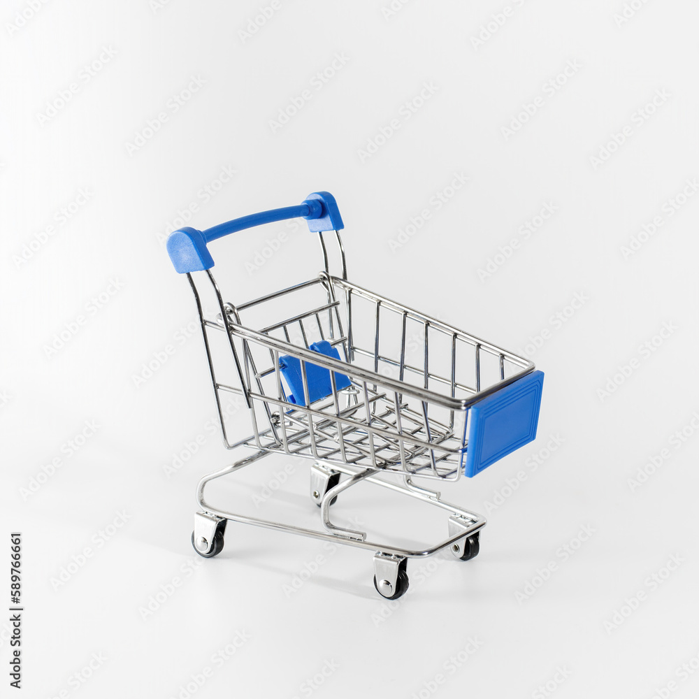 metal empty grocery shopping basket. isolated on a white background. space for copying.