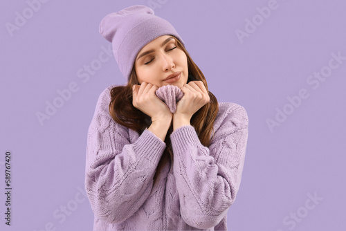 Pretty young woman in knitt...