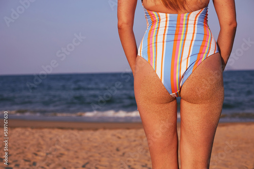 Young woman on the beach. Vacation concept