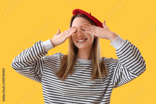 Young woman closing her eye...