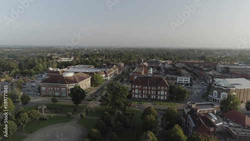 Drone shot of town centre and local park and lots of green trees with birds crossing the sky in Letchworth Garden City photo