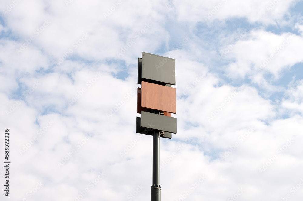 Blank billboard mockups on a tall pole. three billboards with different textures. wooden billboard Blank billboard mockups on a tall pole. three billboards with different textures. wooden billboard