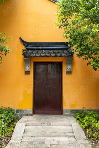 The yellow wall of the temple