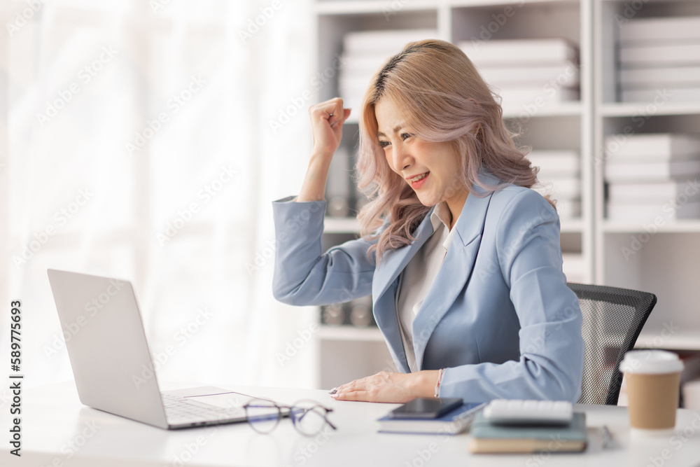 Excited happy woman looking at the laptop computer screen, celebrating an online win, overjoyed young asian female screaming with joy, isolated over a white blur background
Excited happy woman looking at the laptop computer screen, celebrating an online win, overjoyed young asian female screaming with joy, isolated over a white blur background