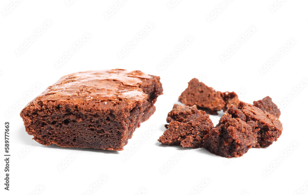 Pieces of tasty chocolate brownie isolated on white background Pieces of tasty chocolate brownie isolated on white background