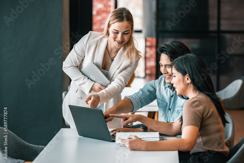 After class, college students discuss, share ideas and thoughts, and learn from each other. Modern and spacious areas in academic libraries that support a more tech-oriented and collaborative society