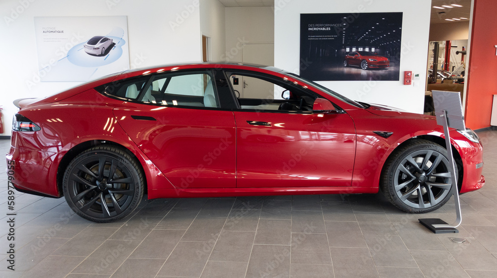 Tesla Model s of electric car vehicle in dealership new car sale ready