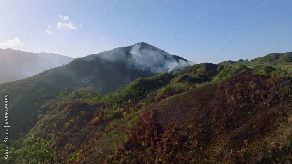 Smoke Coming From Forest Fire At Cabo Cabron National Park In Samana, Dominican Republic. aerial Smoke Coming From Forest Fire At Cabo Cabron National Park In Samana, Dominican Republic. aerial