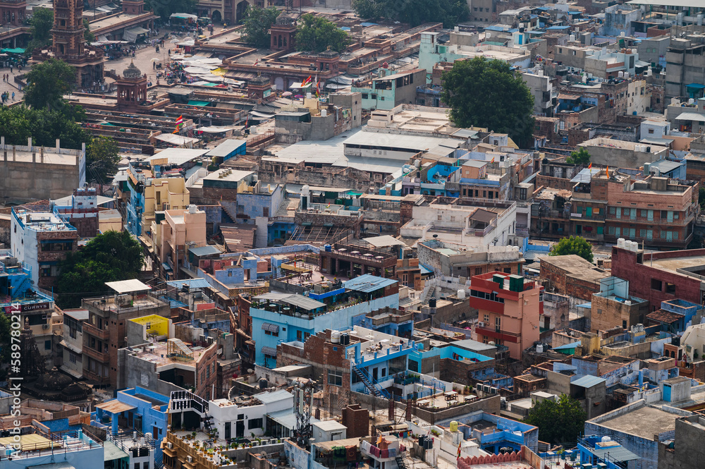 Aerial view of blue city, Jodhpur, Rajasthan,India. Orange sky background. Resident Brahmins worship Lord Shiva and painted their houses in blue as blue is his favourite colour. Hence named blue city.