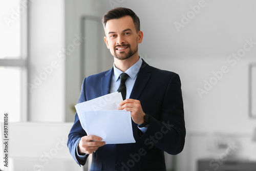 Handsome businessman with d...