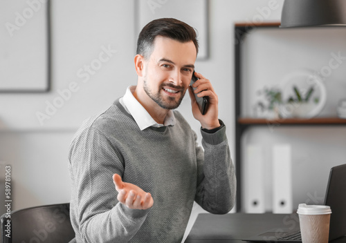 Handsome businessman talkin...