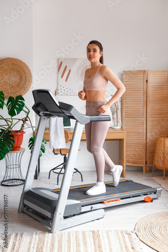 Sporty young woman training...