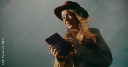 Pensive Thoughtful Woman At Railway Station photo