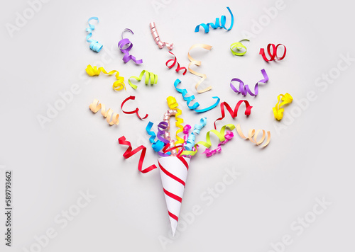 Canvas Print Party cone with serpentine on light background