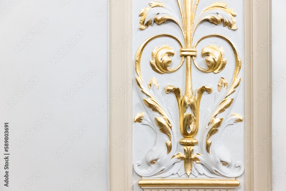 Classic luxury interior details, golden elements of gypsum decoration