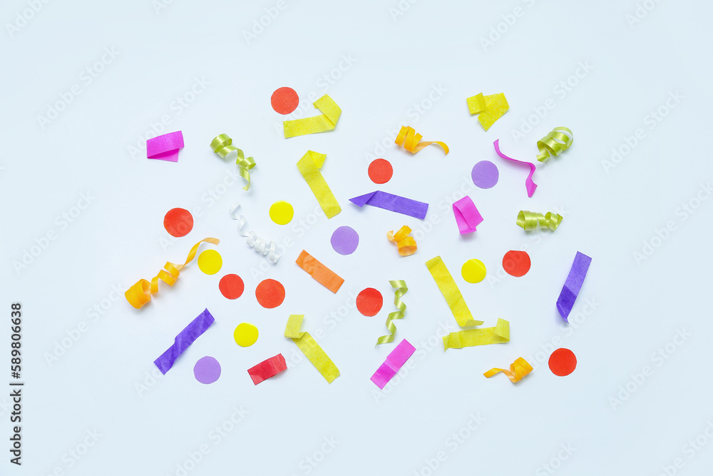 Composition with colorful confetti on white background Composition with colorful confetti on white background
