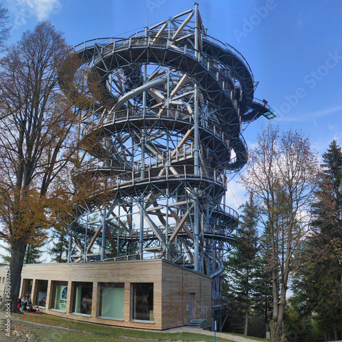 Mlynica (Mill Hill) Observation Tower in spa resort in the Izerskie Mountains. Autumn in Swieradow Zdroj, Poland photo