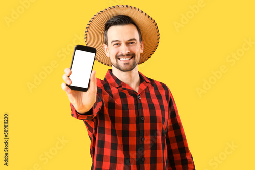 Handsome man with mobile ph...