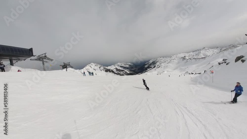 FPV Snowboarder Suddenly Speeding Down Scenic Mountain - POV Group Snowboarding Down Ski Slope in 6K | Insta360 (24 Fps) photo