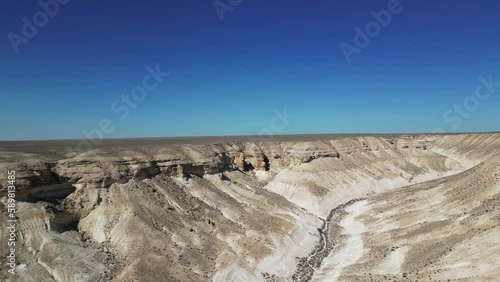 Flying over the hills in the mountain desert
