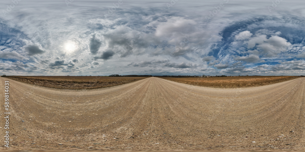 spherical 360 hdri panorama on gravel road with clouds on overcast sky in equirectangular seamless projection, use as sky replacement in drone panoramas, game development as sky dome or VR content