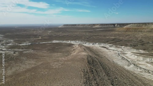 Flying over the hills in the mountain desert