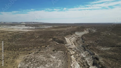 Flying over the hills in the mountain desert