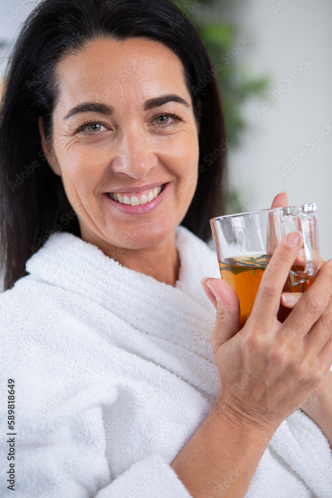 great looking middle aged woman having a tea great looking middle aged woman having a tea