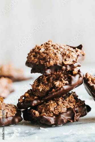 Vertical shot of chocolate cookies on the white background