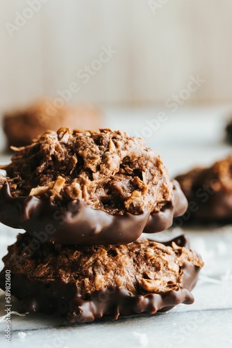 Vertical shot of chocolate cookies on the white background