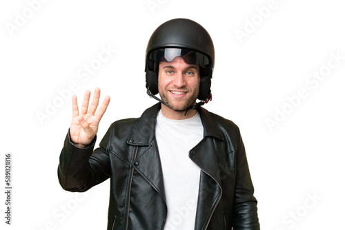 Young caucasian man with a motorcycle helmet isolated on green chroma background happy and counting four with fingers
