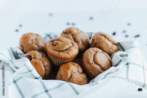 Closeup shot of blueberry muffins on the white background