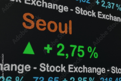 Seoul stock exchange moving up. Seoul, South Korea, positive stock market data on a trading screen. Green percentage sign and ticker information. Stock exchange and business concept. 3D illustration photo