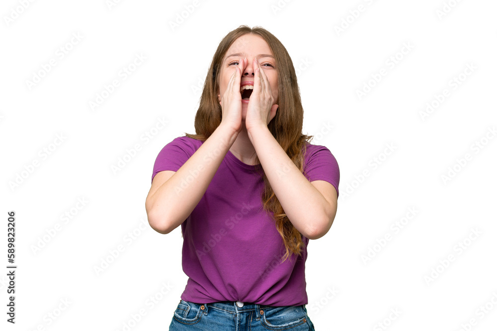 Young pretty woman over isolated background shouting and announcing something Young pretty woman over isolated background shouting and announcing something