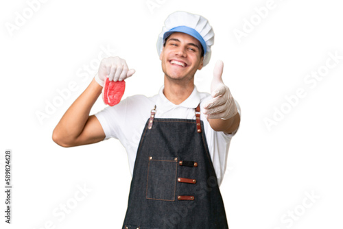 Butcher caucasian man wearing an apron and serving fresh cut meat over isolated background shaking hands for closing a good deal