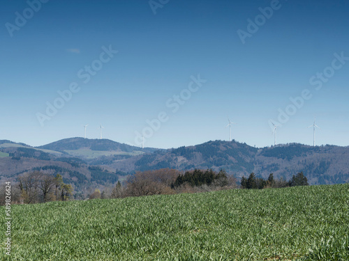 Blick vom Eichener See auf den Schwarzwald, den Gipfel von Gersbach und seine Windräder
 photo