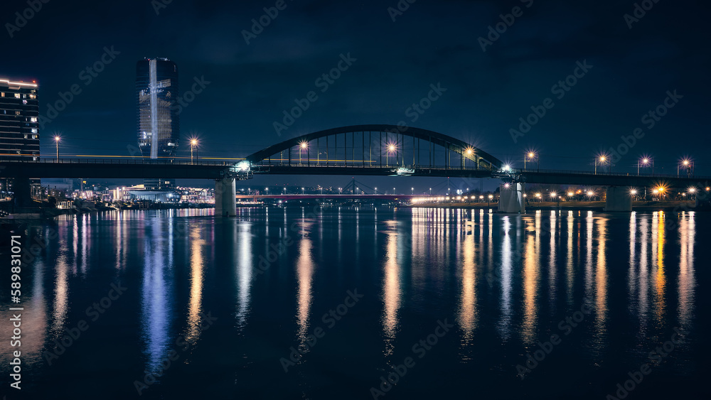 Belgrade Tower, bridges of Sava river and night illumination captured with long exposure in the night. Belgrade, Serbia Belgrade Tower, bridges of Sava river and night illumination captured with long exposure in the night. Belgrade, Serbia