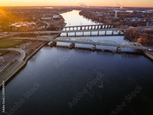 Aerial of the intersection of the Lower Trenton bridge and a highway bridge in Trenton at sunrise