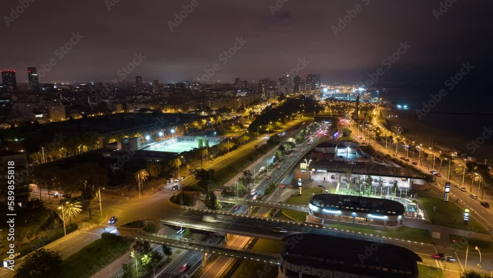 night illuminated flight over barcelona city traffic road bay aerial panorama 4k timelapse spain night illuminated flight over barcelona city traffic road bay aerial panorama 4k timelapse spain