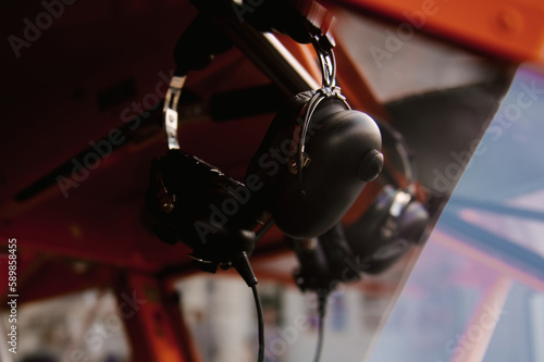 Photo of a small orange airplane for 2 people details
