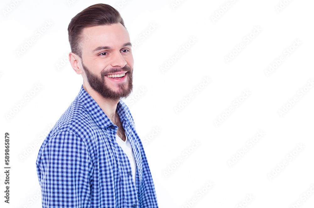 Strong, confident, handsome and bearded man in casual checkered shirt is posing isolated on white background with copy space for text and advertising Strong, confident, handsome and bearded man in casual checkered shirt is posing isolated on white background with copy space for text and advertising