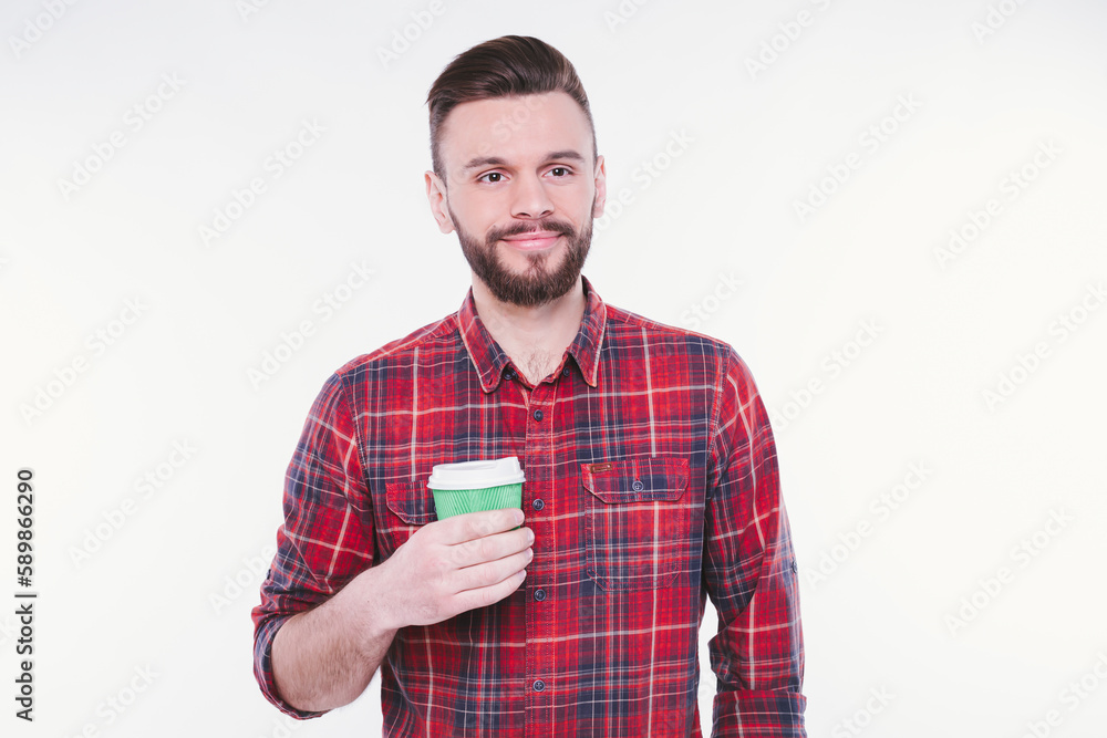 Handsome bearded man drinks coffee from paper cup. Coffee to go. Cafe concept. Coffee shop. Good morning. Happy guy enjoy fresh hot tea. Smiling barista offer you beverage. Handsome bearded man drinks coffee from paper cup. Coffee to go. Cafe concept. Coffee shop. Good morning. Happy guy enjoy fresh hot tea. Smiling barista offer you beverage.