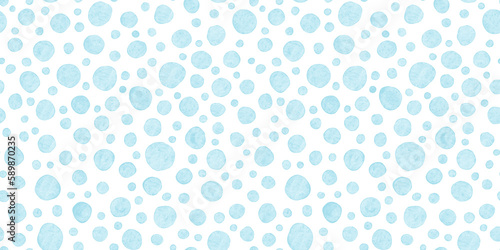 Seamless hand drawn playful watercolor polka dots or animal spots pattern in pastel blue and white. Abstract geometric circles background texture. Baby boy's blanket, clothing or nursery wallpaper.