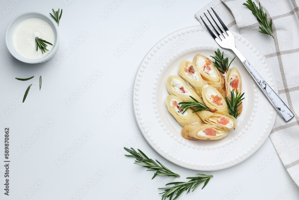 Concept of tasty food, thin pancakes with filling, space for text Concept of tasty food, thin pancakes with filling, space for text