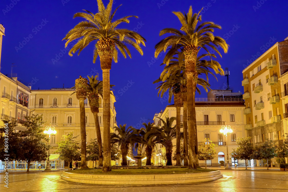 Fototapeta premium View of Maria Immacolata Square (Piazza Maria Immacolata) of Taranto at the first light of dawn. Puglia, Italy