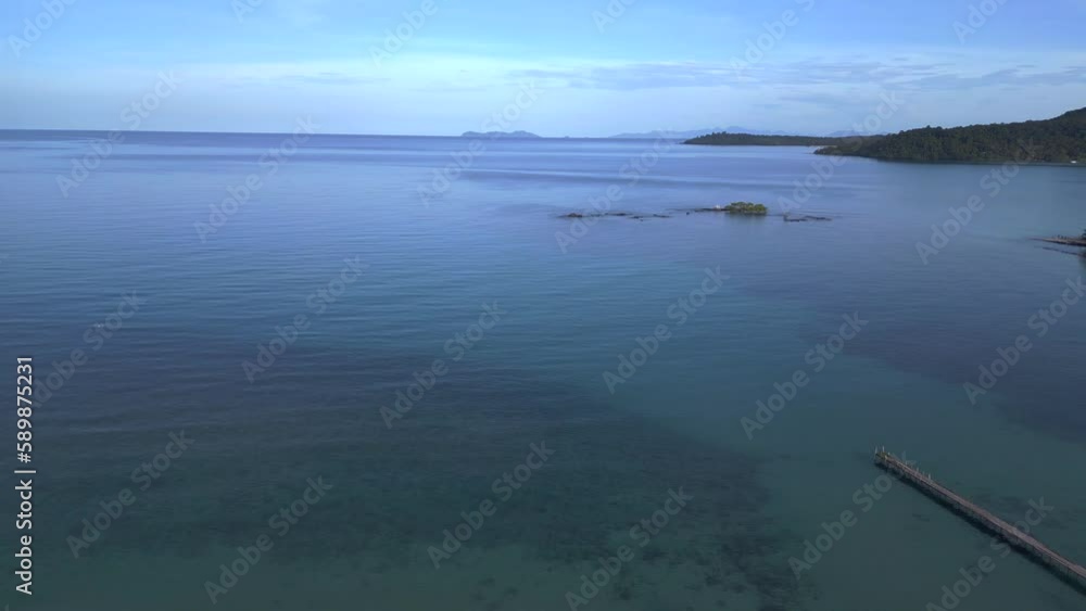 palm garden on beach with huts at blue lagoon bay. Best aerial view flight drone palm garden on beach with huts at blue lagoon bay. Best aerial view flight drone