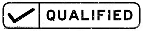 Grunge black qualified word with right check mark icon square rubber seal stamp on white background